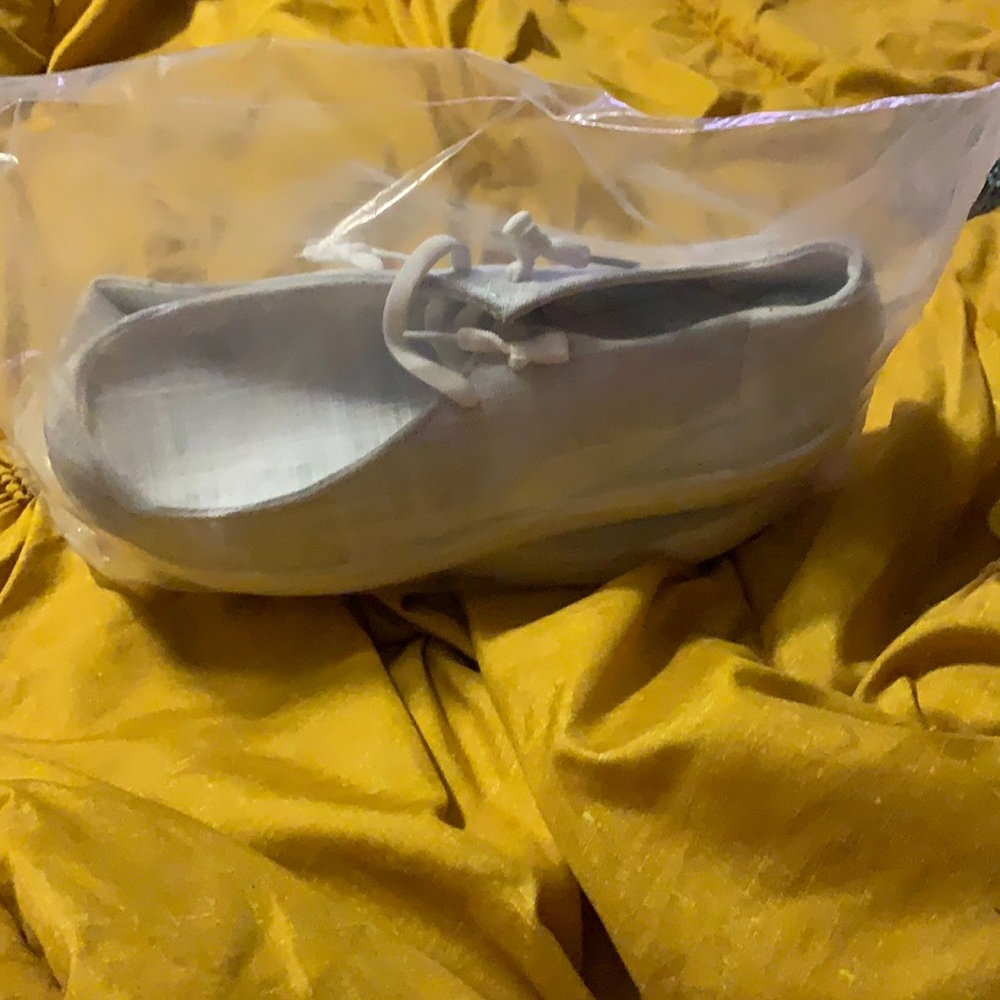Brand new shoes still in bag size 8
